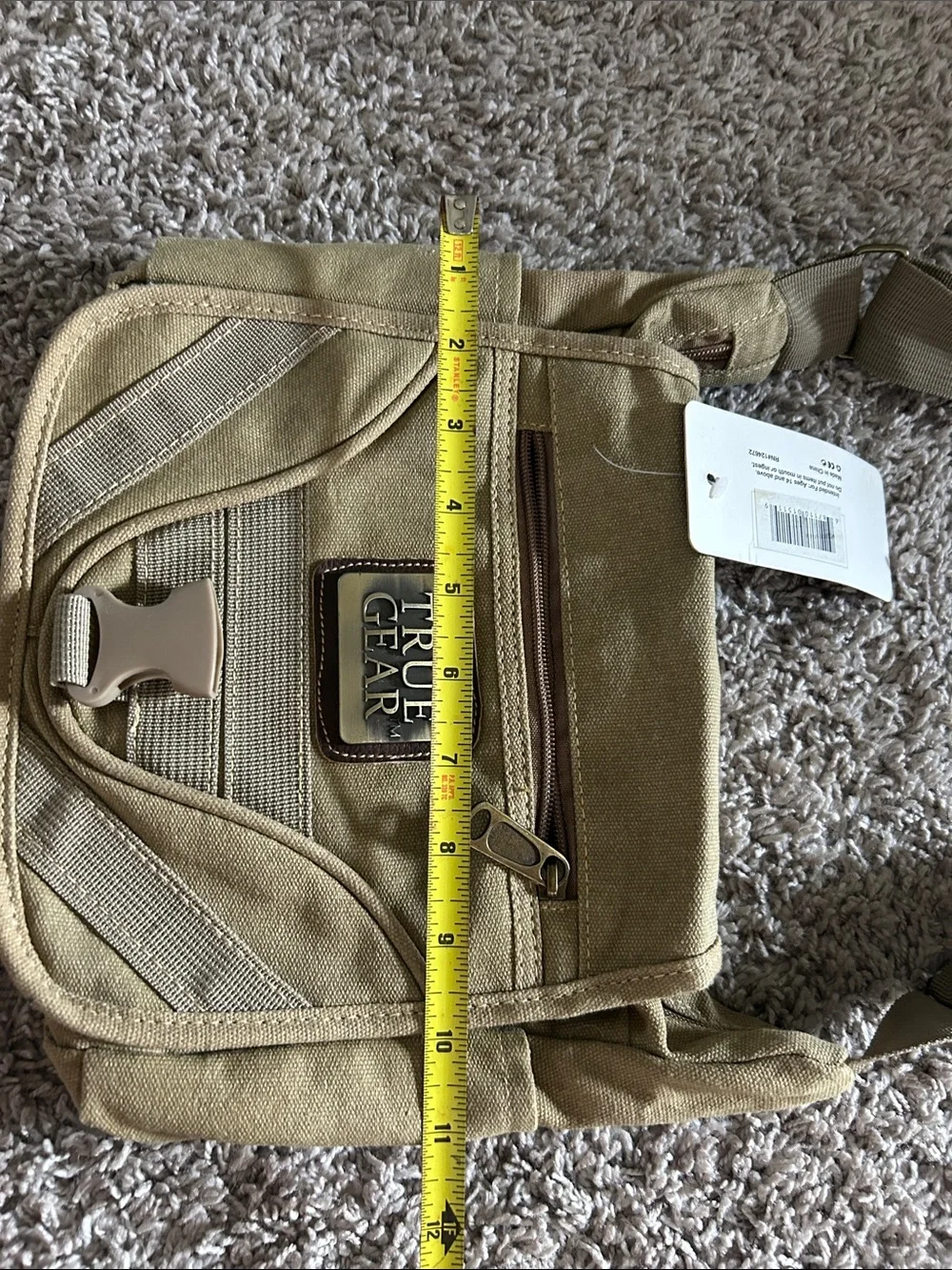 Tan/khaki  Messenger crossbody Bag with Adjustable Strap. Waterproof liner